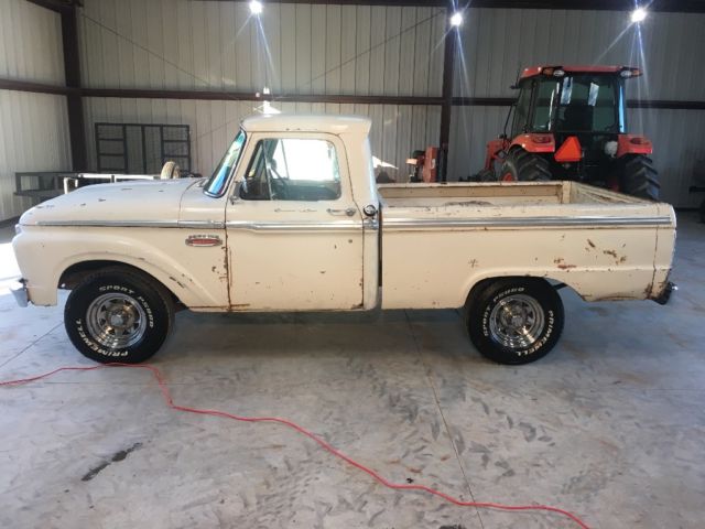 1965 White with some patina in areas. Ford F-100 Custom can short bed