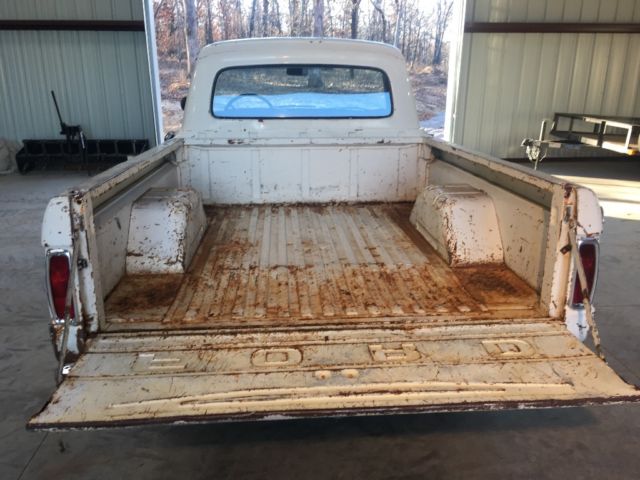 1965 White with some patina in areas. Ford F-100 Custom can short bed