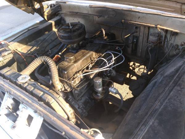 1965 Frost Turquoise  & Wimbledon White Ford F-100 Standard Cab Pickup