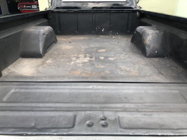 1965 Black Ford F-100 Cab & Chassis