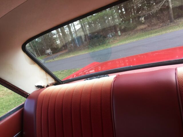 1965 Red Ford Falcon Sedan