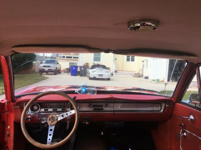 1965 Red Ford Falcon Sedan