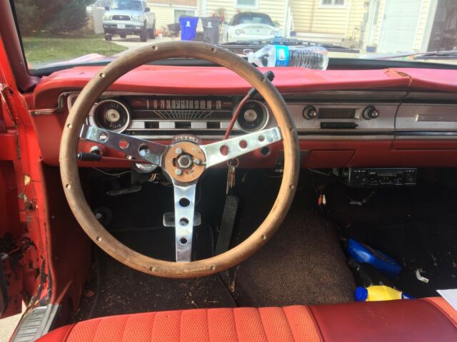 1965 Red Ford Falcon Sedan