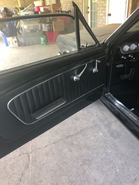 1965 Black Ford Mustang