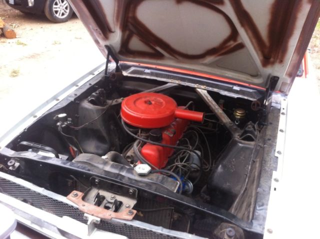 1965 Poppy Red Ford Mustang Coupe