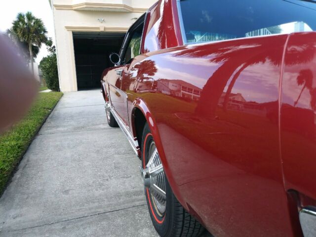 1965 Red Ford Mustang Coupe