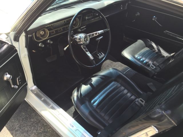 1965 Wimbledon White / Guardsman Blue Ford Mustang Fastback