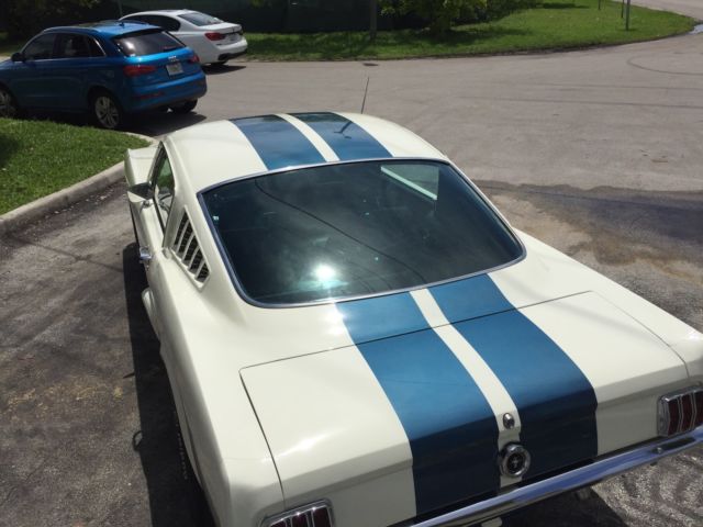 1965 Wimbledon White / Guardsman Blue Ford Mustang Fastback