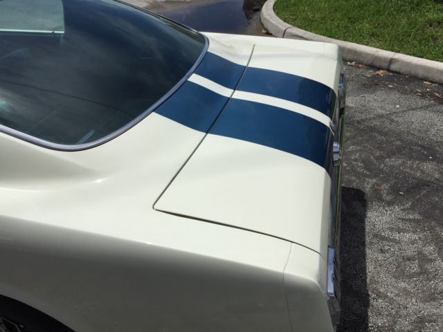 1965 Wimbledon White / Guardsman Blue Ford Mustang Fastback