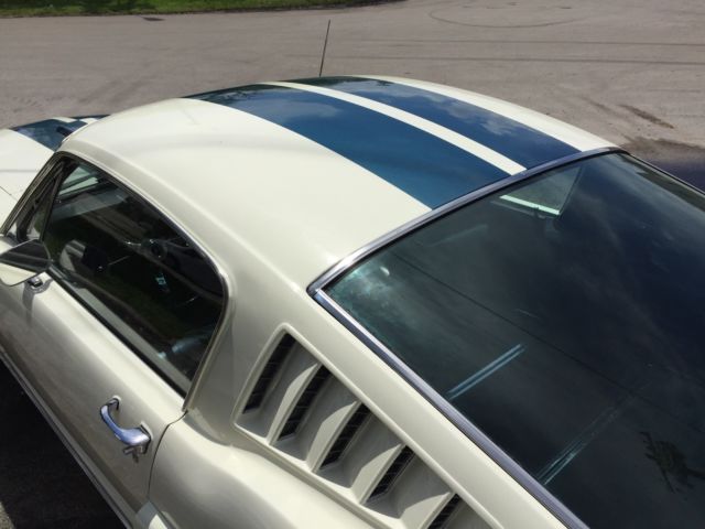 1965 Wimbledon White / Guardsman Blue Ford Mustang Fastback