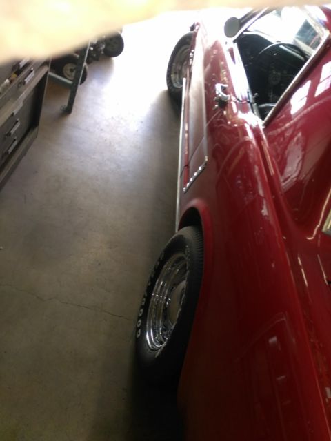 1965 Burgundy Ford Mustang