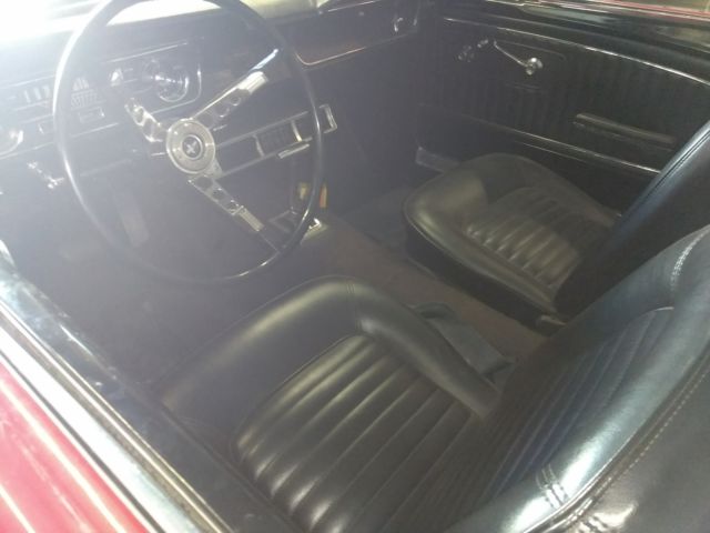 1965 Burgundy Ford Mustang