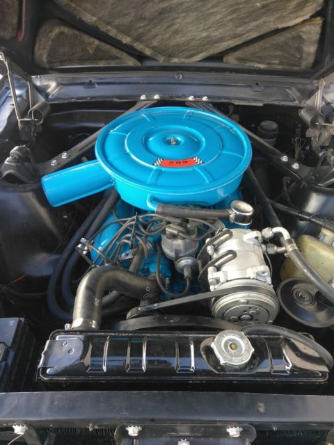 1965 Burgundy Ford Mustang