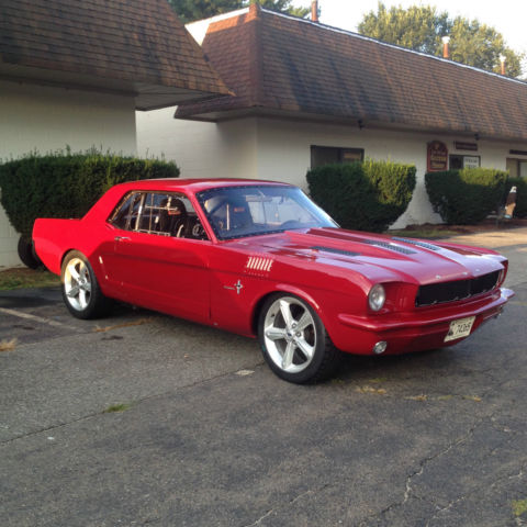 1965 red Ford Mustang U/K