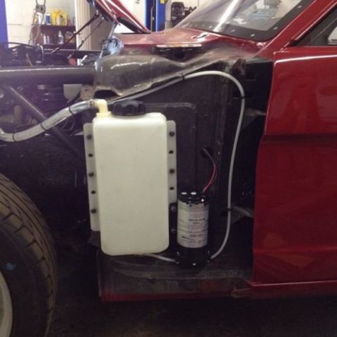 1965 red Ford Mustang U/K