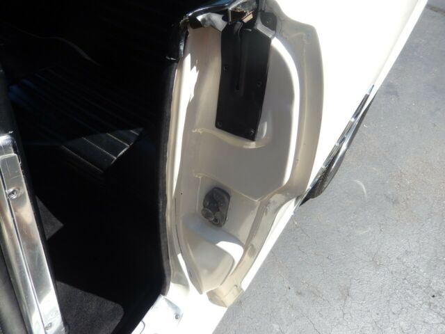 1965 Ermine white Ford Mustang Sedan