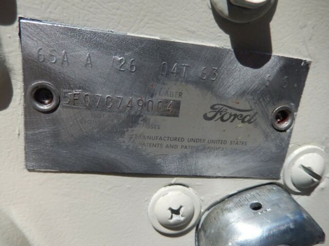 1965 Ermine white Ford Mustang Sedan