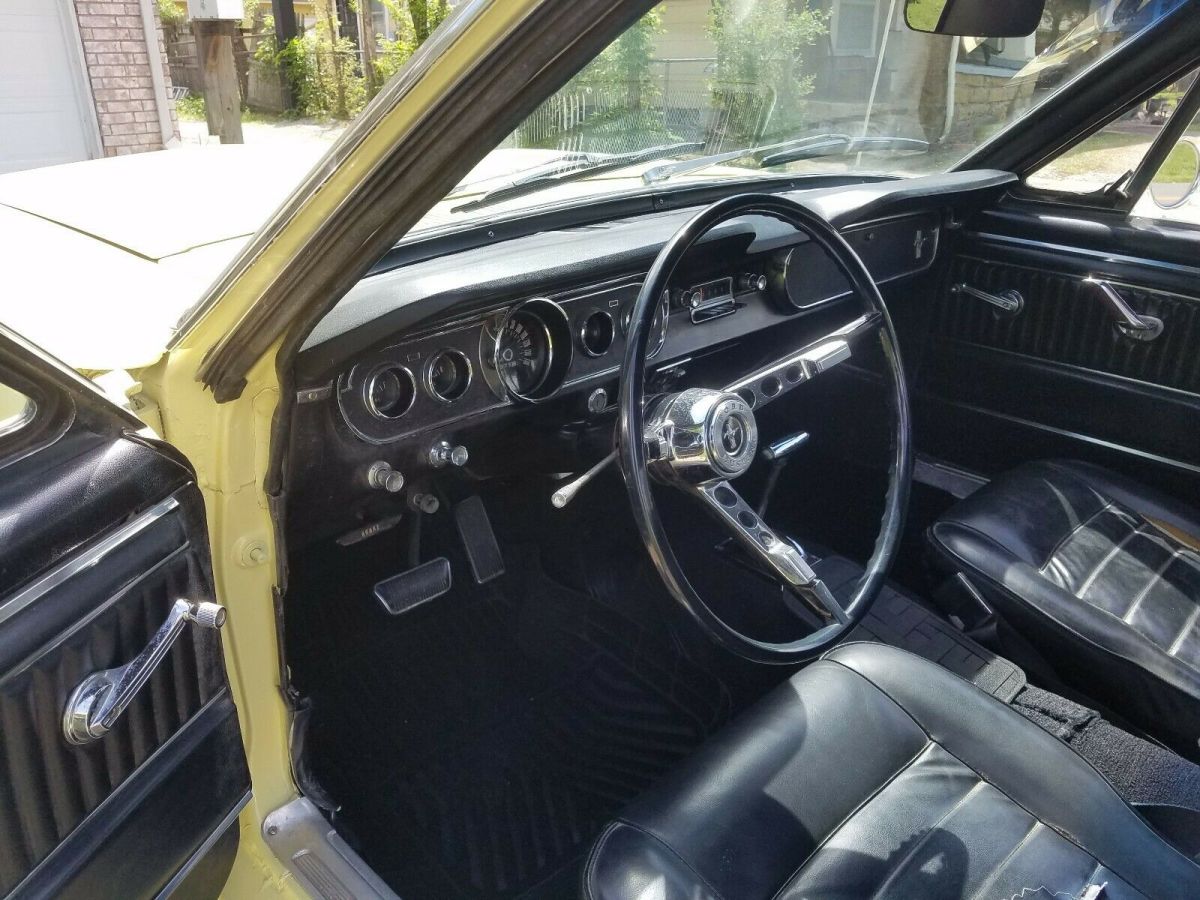 1965 yellow Ford Mustang Coupe