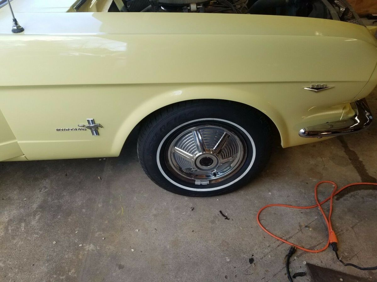 1965 yellow Ford Mustang Coupe