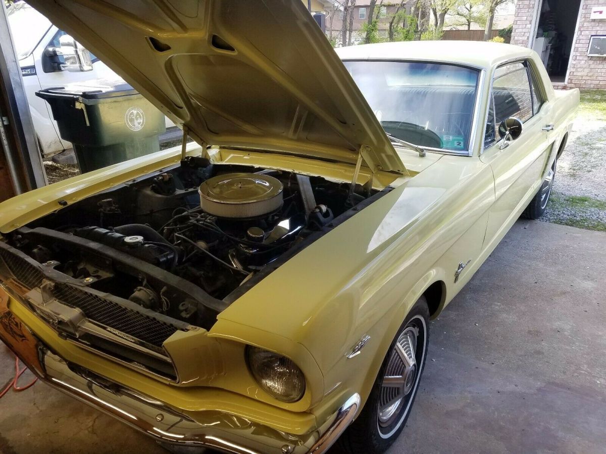 1965 yellow Ford Mustang Coupe