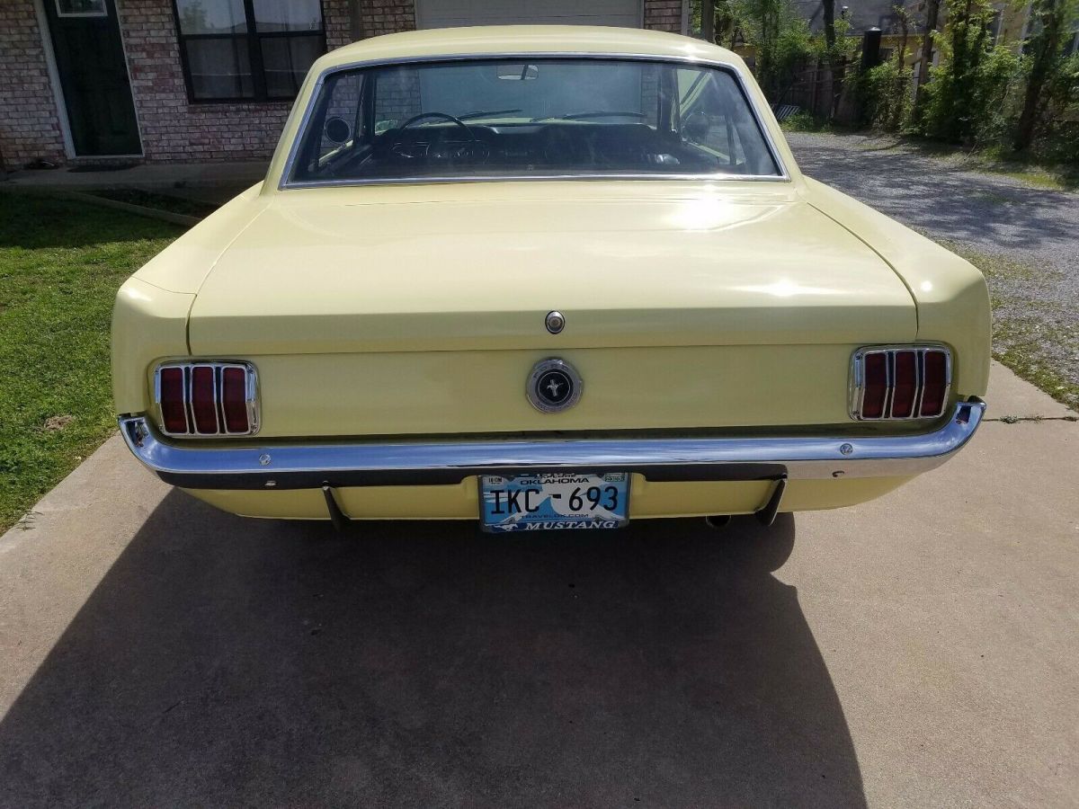 1965 yellow Ford Mustang Coupe
