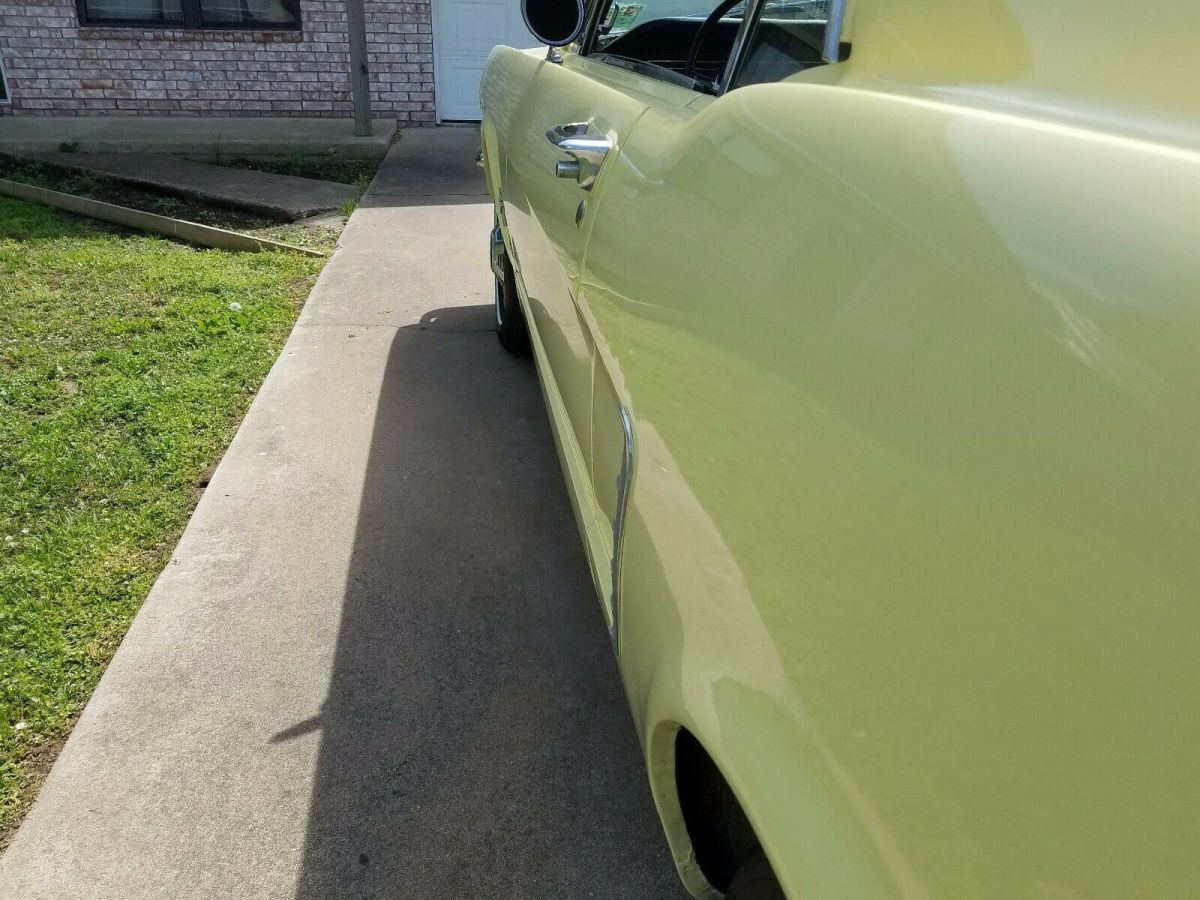 1965 yellow Ford Mustang Coupe