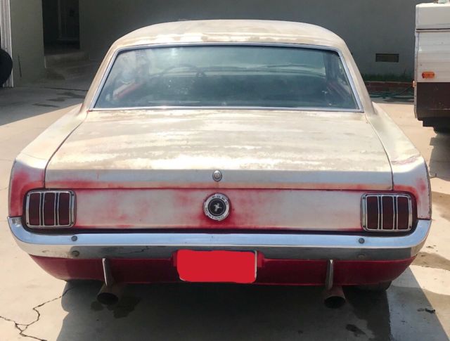 1965 Candy apple (faded) Ford Mustang Coupe