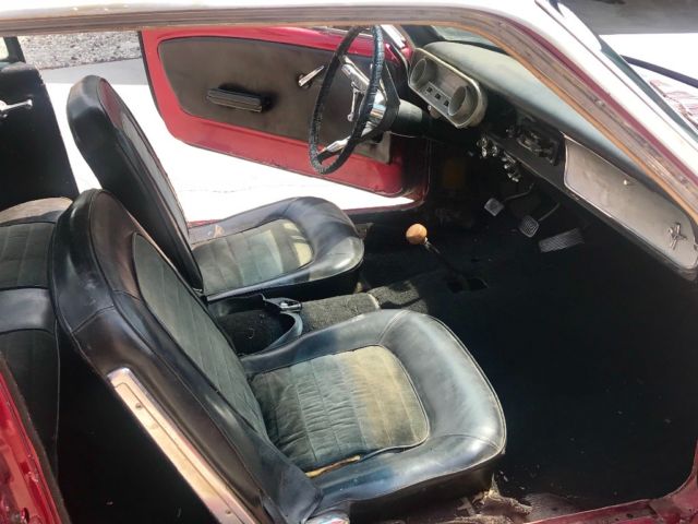 1965 Candy apple (faded) Ford Mustang Coupe