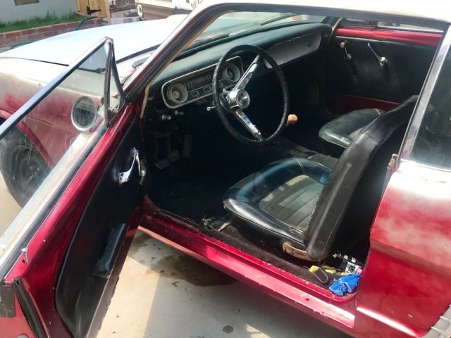 1965 Candy apple (faded) Ford Mustang Coupe