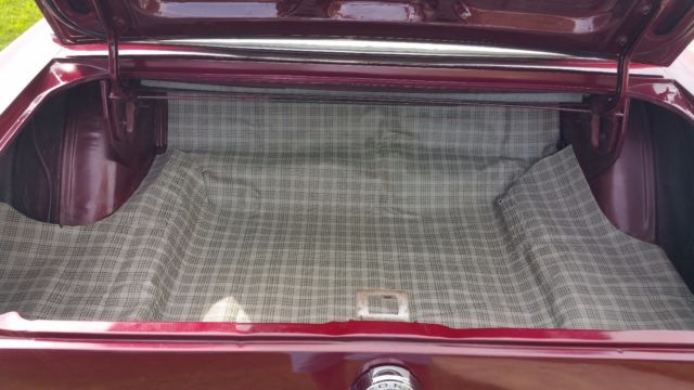 1965 Burgundy Ford Mustang Convertible