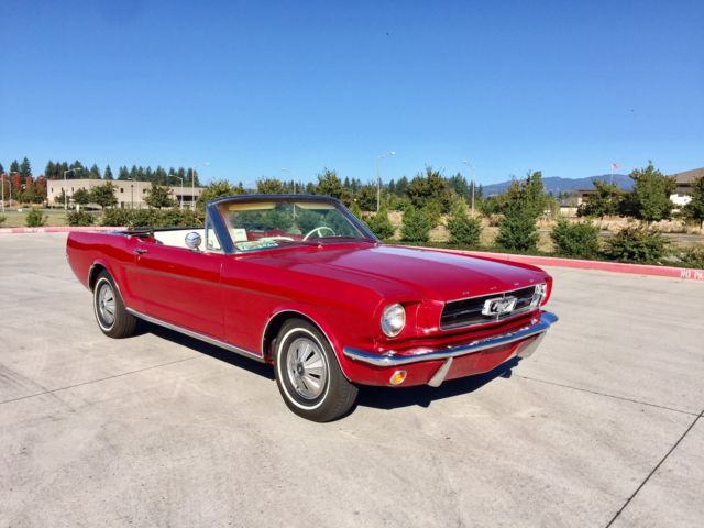 1965 red Ford Mustang Convertible