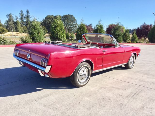 1965 red Ford Mustang Convertible
