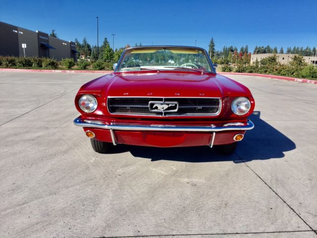 1965 red Ford Mustang Convertible