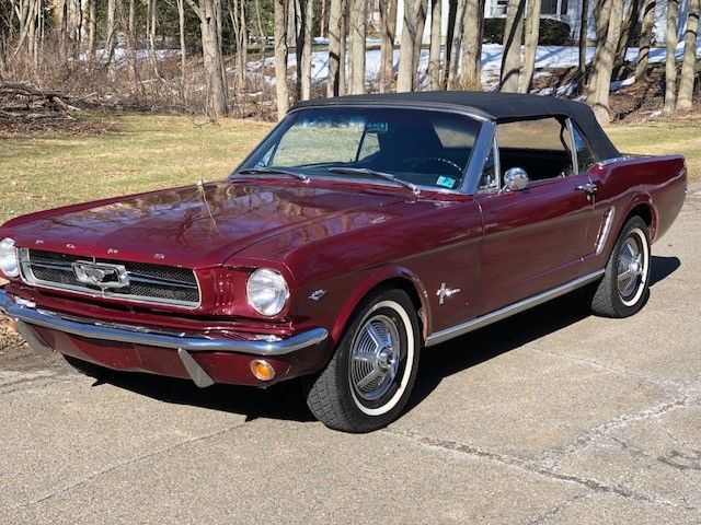1964 vintage bergundy Ford Mustang