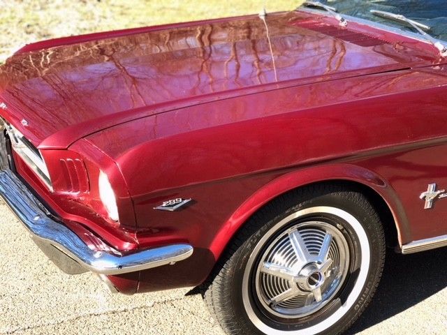 1964 vintage bergundy Ford Mustang