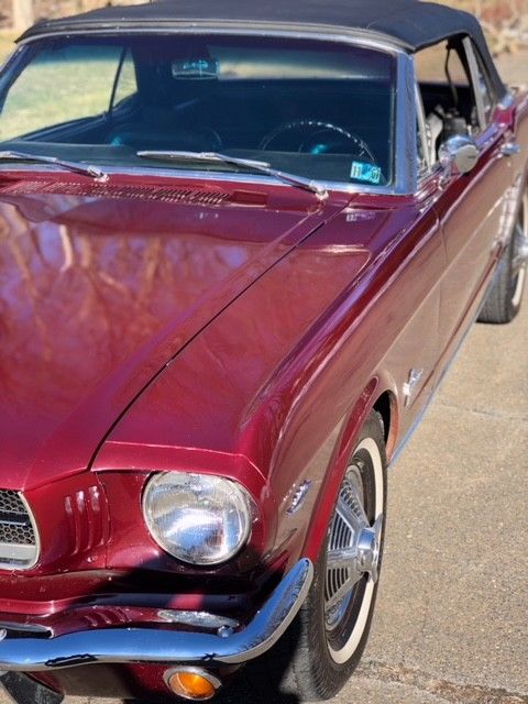 1964 vintage bergundy Ford Mustang