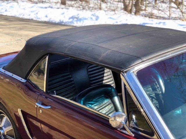1964 vintage bergundy Ford Mustang