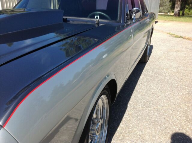 1965 Silver Ford Mustang Coupe