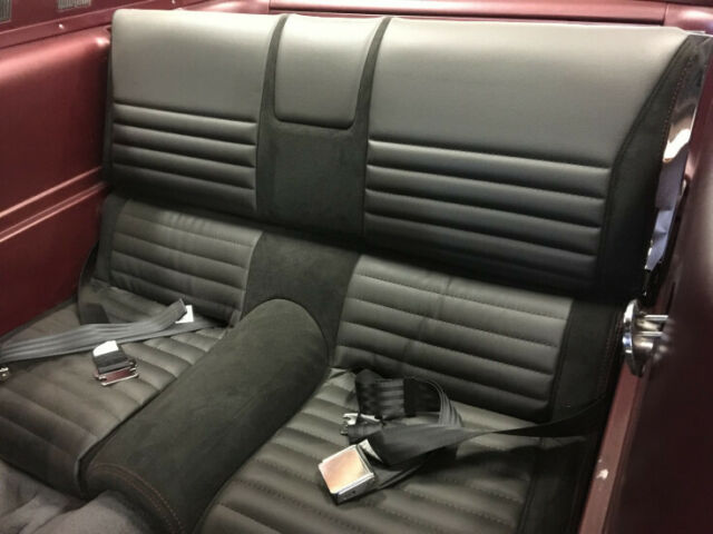 1965 red Ford Mustang Coupe