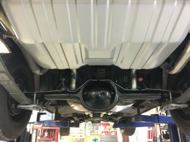 1965 red Ford Mustang Coupe