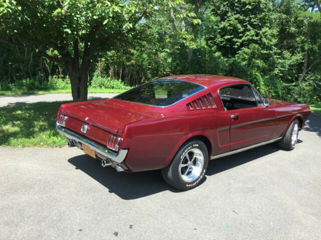 1965 red Ford Mustang Coupe
