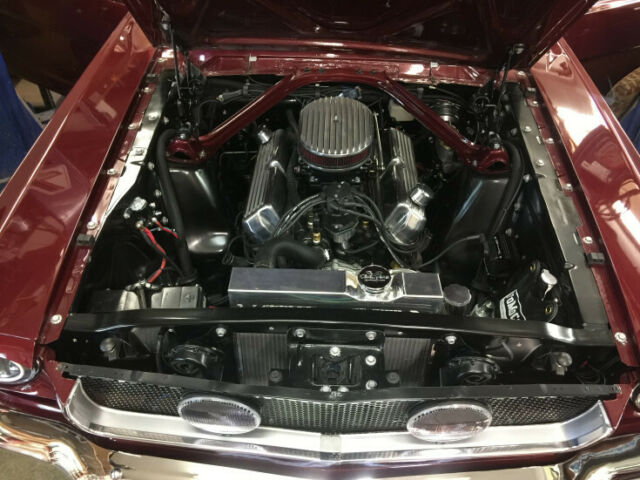 1965 red Ford Mustang Coupe