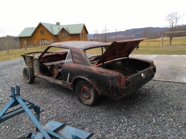 1965 Silver Ford Mustang