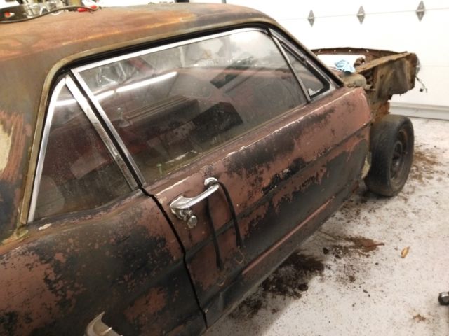 1965 Silver Ford Mustang