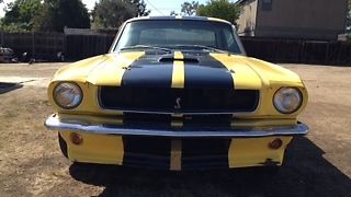 1965 Yellow W Black strips Ford Mustang notch back