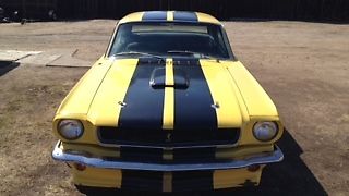 1965 Yellow W Black strips Ford Mustang notch back