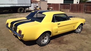 1965 Yellow W Black strips Ford Mustang notch back