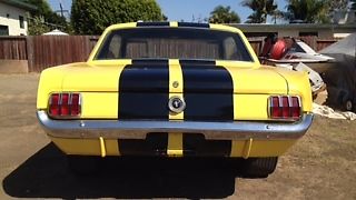 1965 Yellow W Black strips Ford Mustang notch back