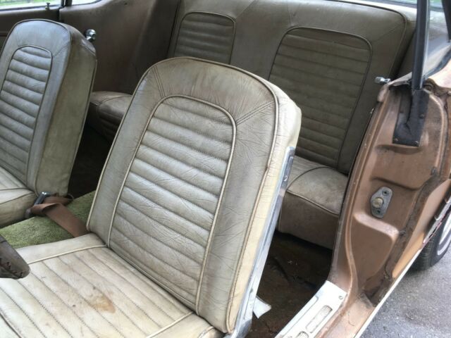 1965 prairie bronze Ford Mustang Coupe