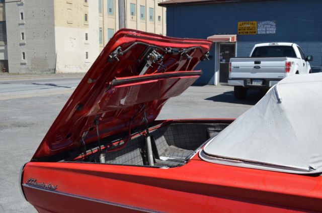 1965 red Ford Thunderbird